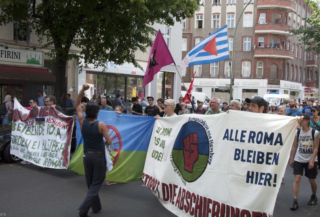 picture of a demonstration by Roma families in Berlin protesting against imminent deportation